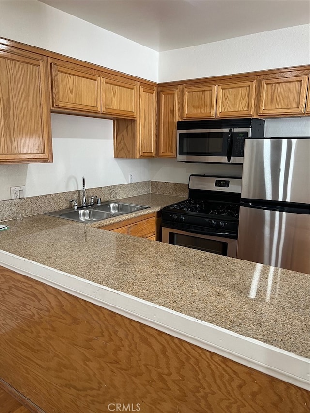 kitchen with stainless steel appliances and sink