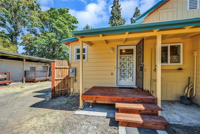 doorway to property featuring board and batten siding