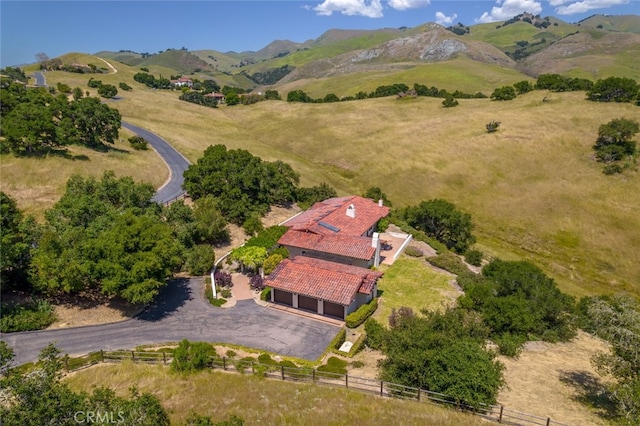 drone / aerial view with a rural view and a mountain view