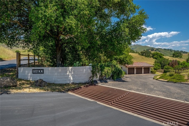 exterior space featuring a mountain view