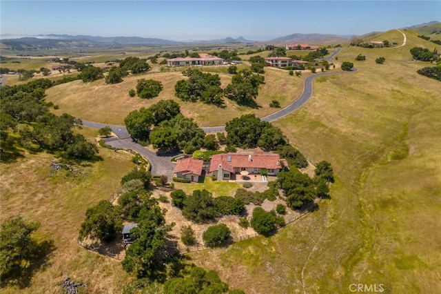 bird's eye view featuring a mountain view and a rural view