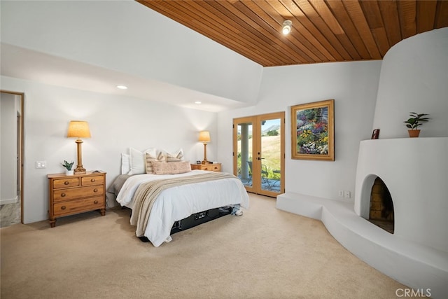 carpeted bedroom with wooden ceiling, vaulted ceiling, french doors, and access to exterior