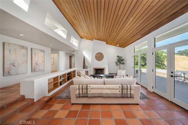 bedroom featuring wood ceiling, high vaulted ceiling, access to exterior, tile patterned flooring, and french doors