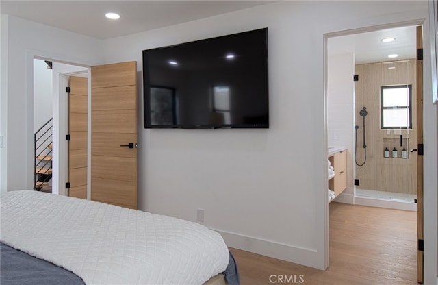 bedroom featuring light wood-type flooring