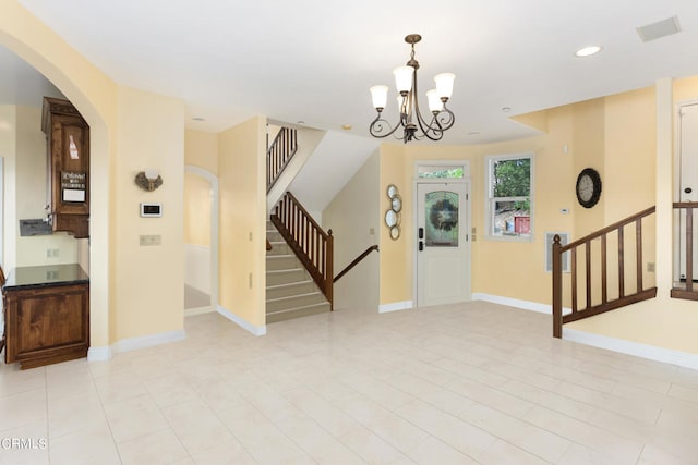 interior space featuring a notable chandelier