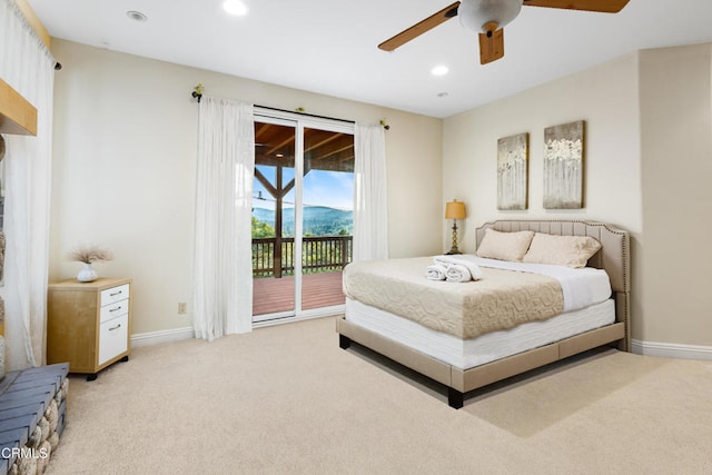 carpeted bedroom featuring ceiling fan and access to exterior