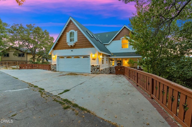 view of front of property with a garage