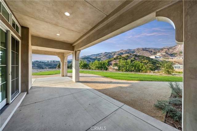 view of patio with a mountain view