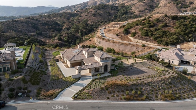 drone / aerial view featuring a mountain view