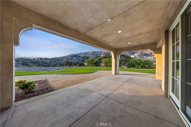 view of patio / terrace with a mountain view