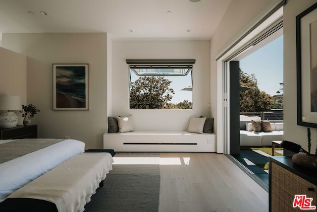 bedroom with light hardwood / wood-style flooring