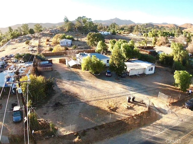 birds eye view of property featuring a mountain view