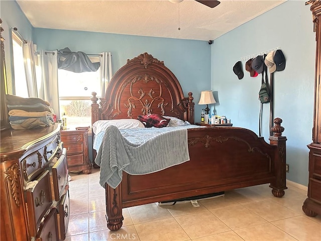 tiled bedroom with ceiling fan