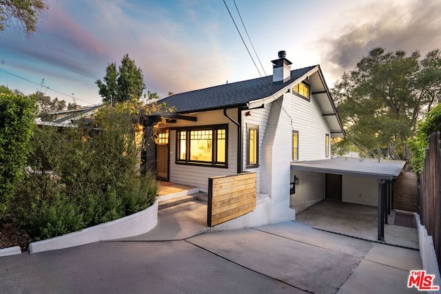 view of front of house with a carport