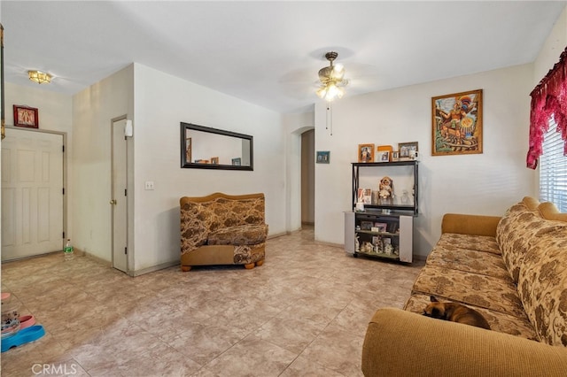 living room featuring ceiling fan