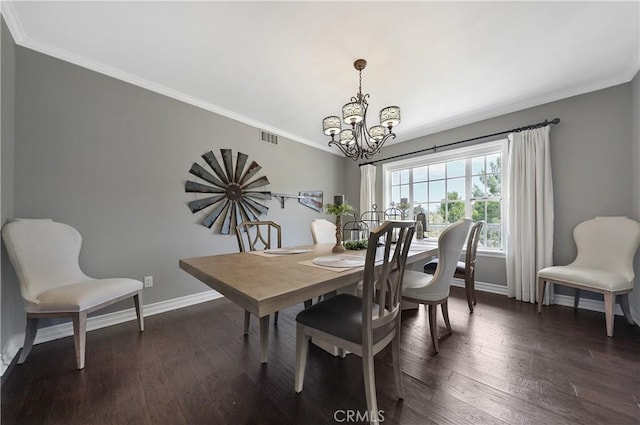 dining space with a chandelier, dark hardwood / wood-style floors, and ornamental molding