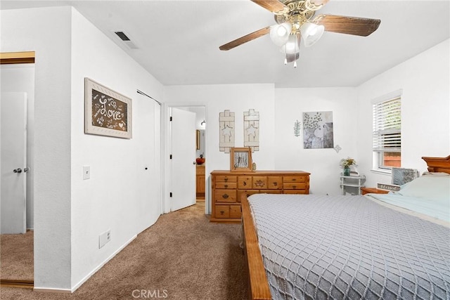 carpeted bedroom featuring ceiling fan