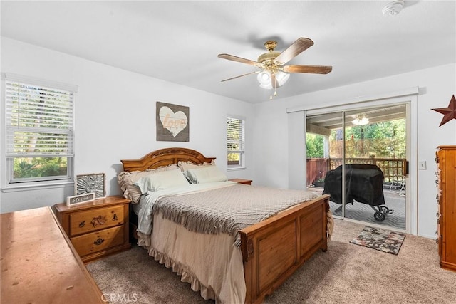 carpeted bedroom with access to outside and ceiling fan