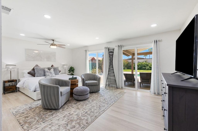 bedroom with access to outside, ceiling fan, and light wood-type flooring