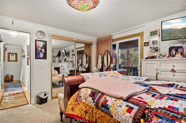 179 Golf Course Rd, Lake Arrowhead, CA 92317 - bedroom featuring ornamental molding, light colored carpet, a textured ceiling, and access to outside