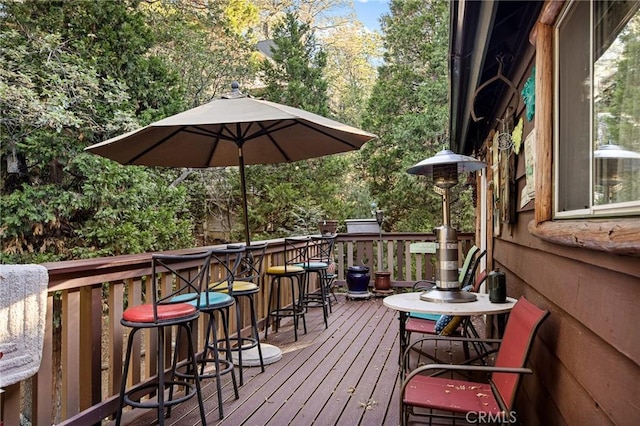 179 Golf Course Rd, Lake Arrowhead, CA 92317 - wooden deck with view of scattered trees