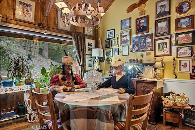 179 Golf Course Rd, Lake Arrowhead, CA 92317 - dining space featuring hardwood / wood-style flooring, wainscoting, a chandelier, and vaulted ceiling