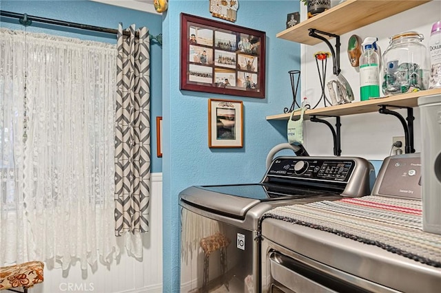 laundry area with washer and clothes dryer