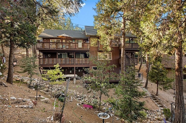 179 Golf Course Rd, Lake Arrowhead, CA 92317 - rear view of house with a deck and stairway