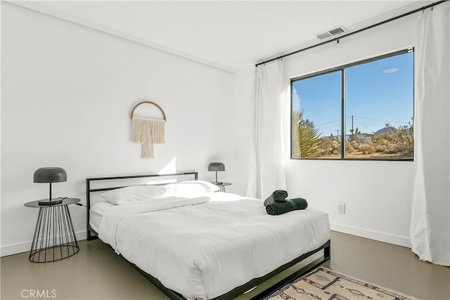 bedroom with wood-type flooring