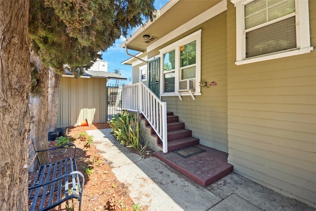 doorway to property with cooling unit