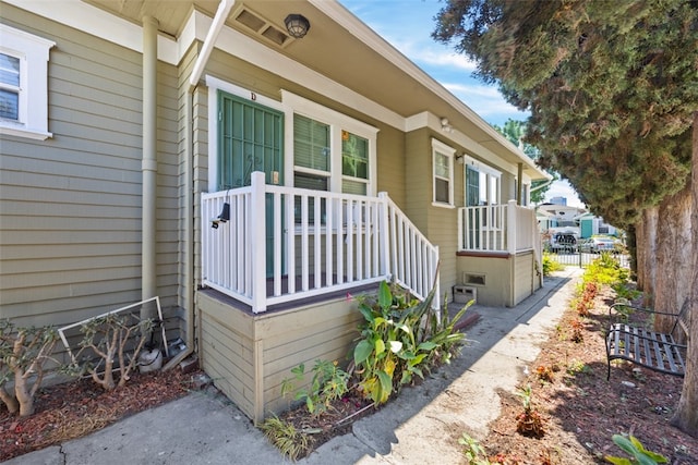 entrance to property with a porch