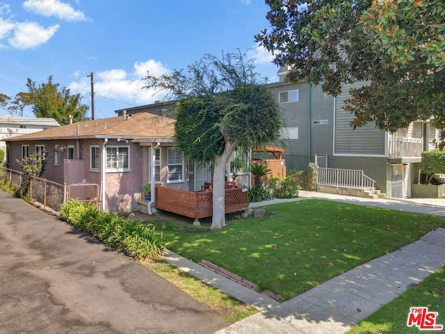 view of front of home with a front lawn