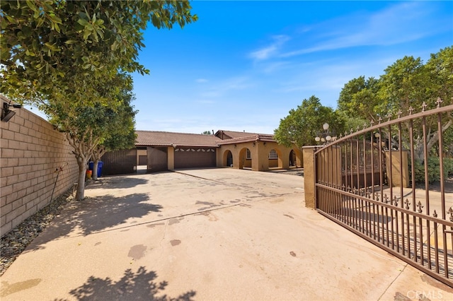 view of side of property featuring a garage