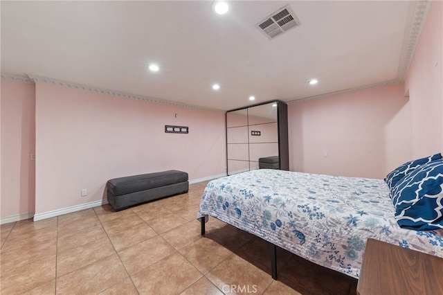 bedroom with light tile patterned flooring