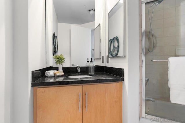 bathroom featuring vanity and walk in shower