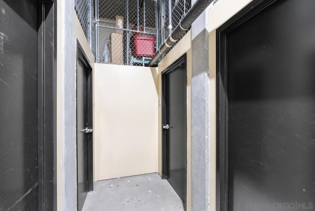 hallway featuring concrete floors