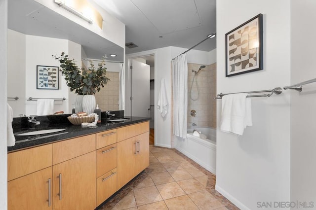 bathroom with vanity, tile patterned floors, and shower / bath combination with curtain