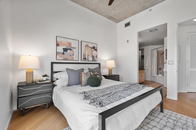 bedroom featuring ceiling fan and hardwood / wood-style flooring