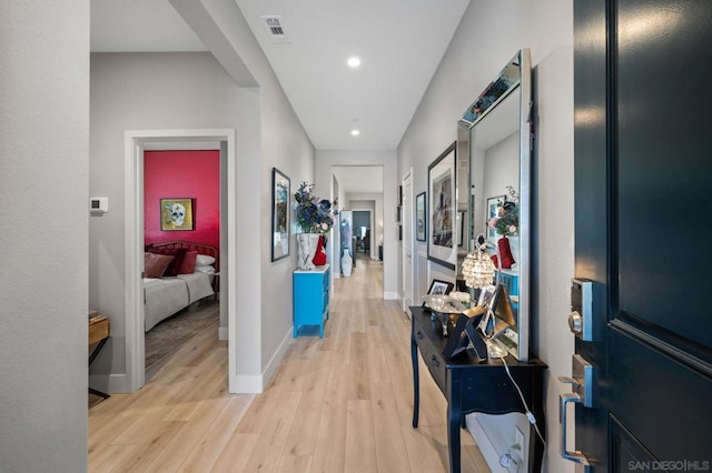 hallway featuring light wood-type flooring