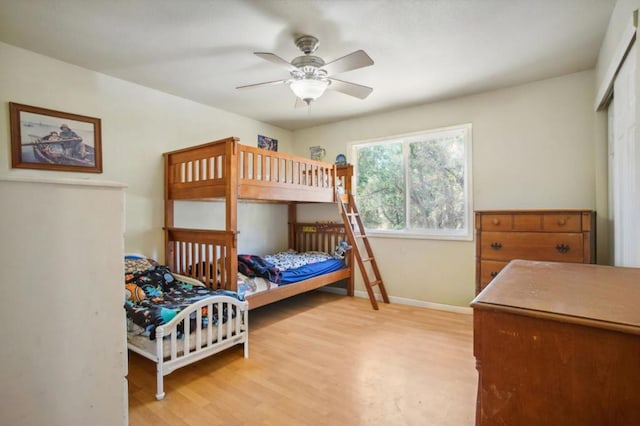 bedroom featuring light hardwood / wood-style floors and ceiling fan