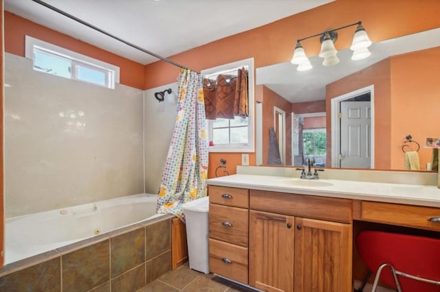 bathroom with vanity, tile patterned flooring, and a wealth of natural light