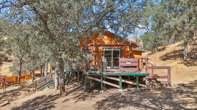 view of yard featuring a wooden deck