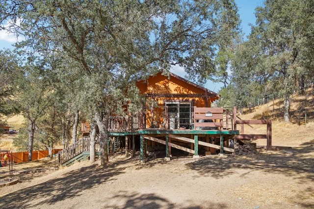 exterior space featuring a wooden deck