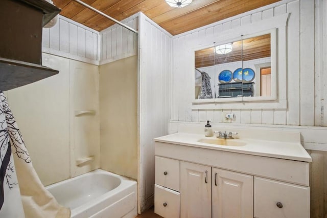 bathroom featuring wooden ceiling, vanity, and shower / bath combo with shower curtain