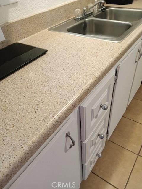 details with sink and white cabinets