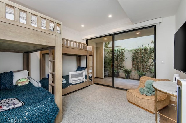 carpeted bedroom with access to exterior and crown molding