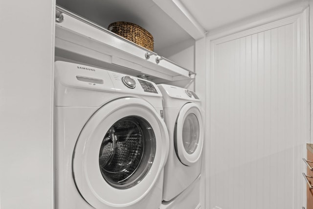 laundry room with separate washer and dryer