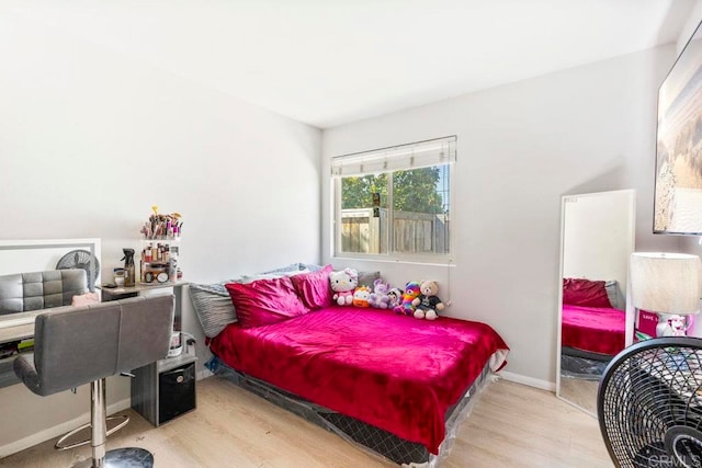 bedroom featuring light wood-type flooring