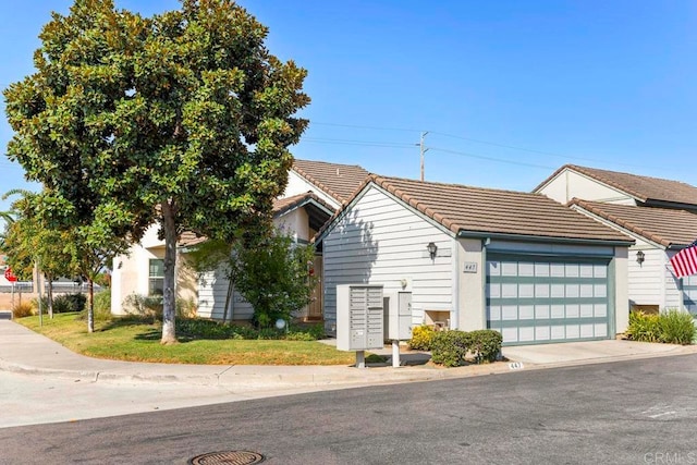 view of front of property featuring a garage