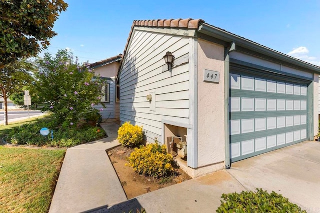 view of home's exterior featuring a garage